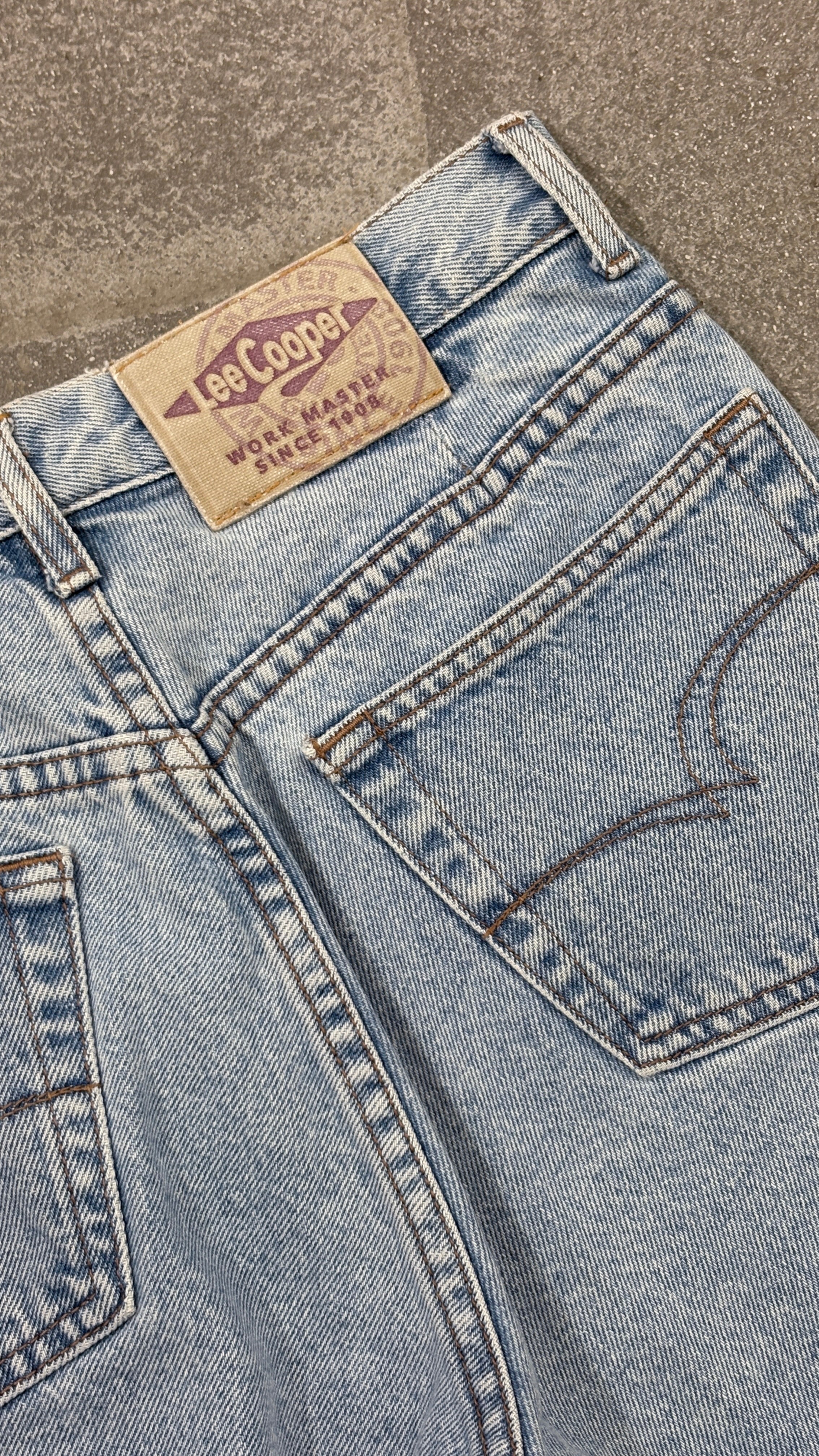 Vintage Lee Cooper denim shorts in a light blue wash