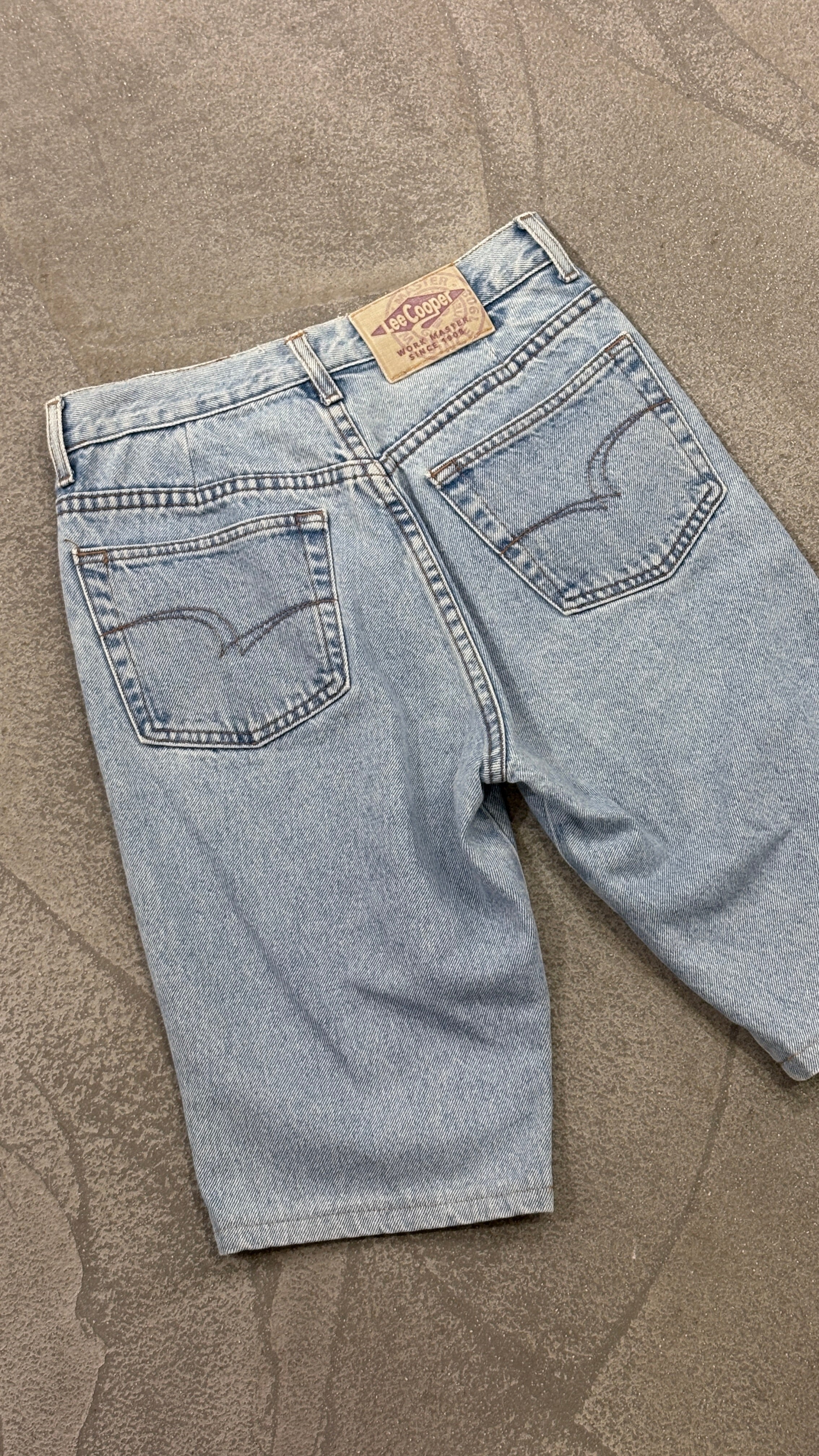 Vintage Lee Cooper denim shorts in a light blue wash