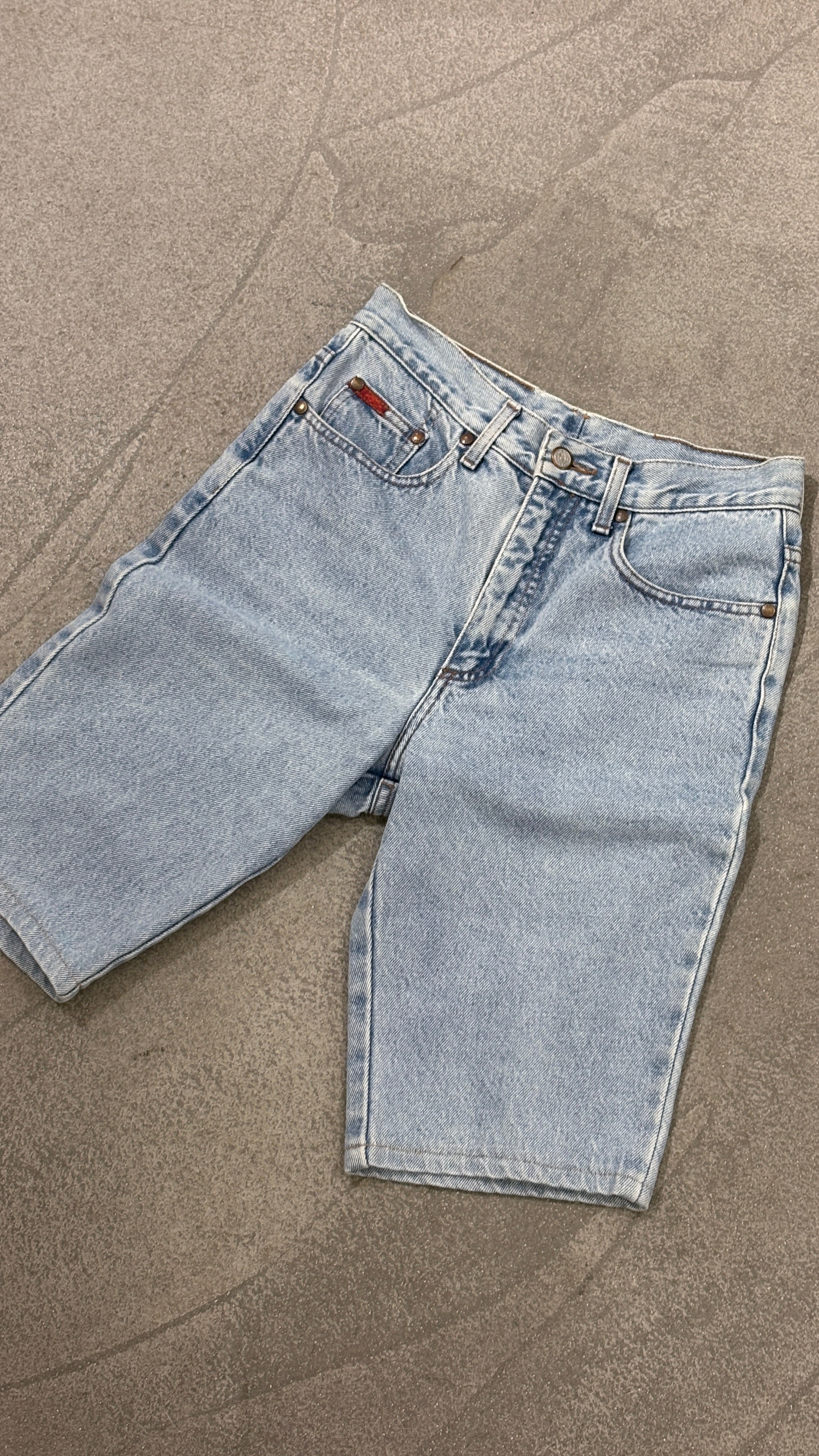 Vintage Lee Cooper denim shorts in a light blue wash