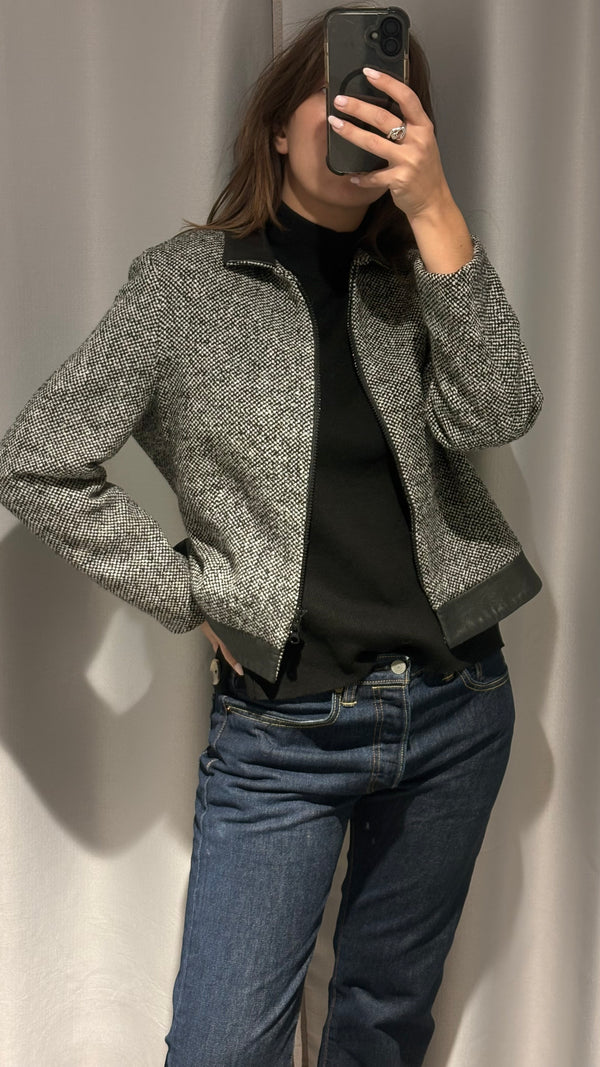 Tweed wool jacket with natural sheepskin finishes premium quality, minimalist aesthetic.