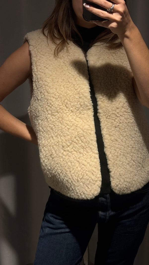 Natural wool shearling vest in a creamy shade perfect for winter