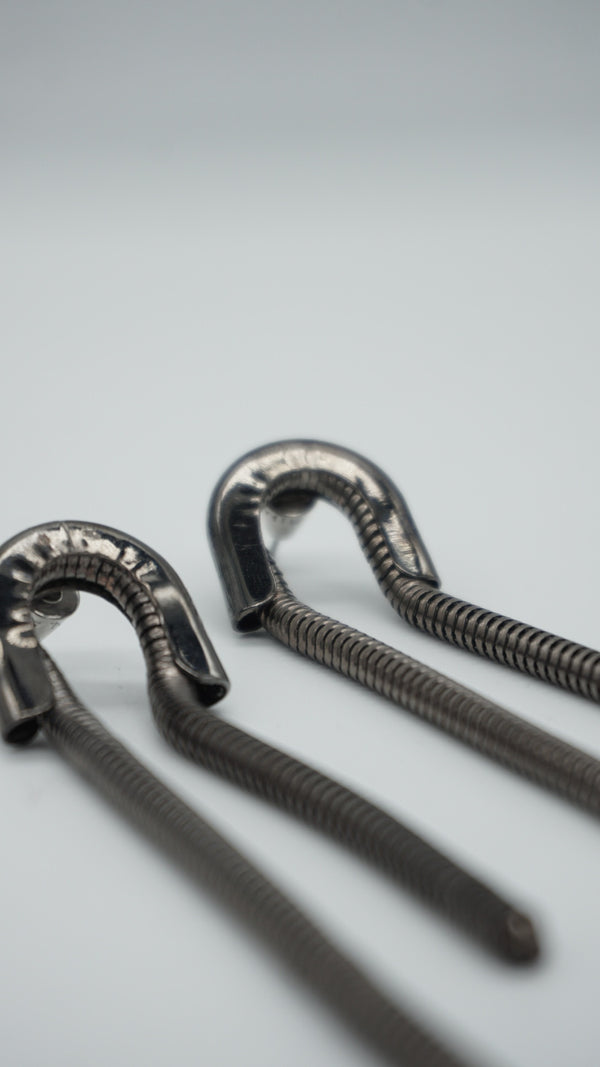 Long silver Bimba y Lola earrings