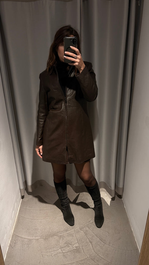 Fitted mid-length coat made from natural sheep leather in a deep chocolate-brown tone.