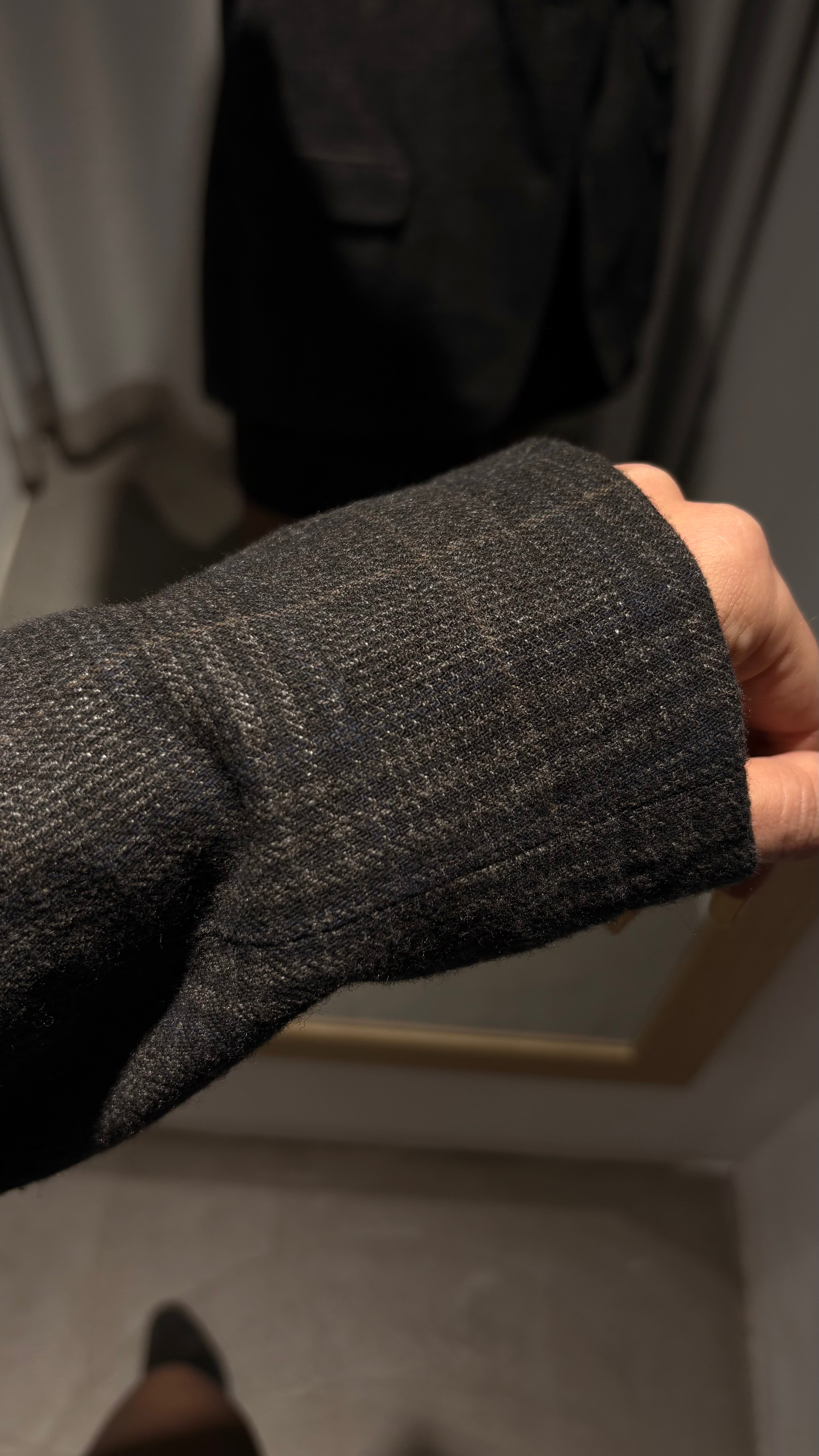 Grey cotton check blazer with subtle brown accents.