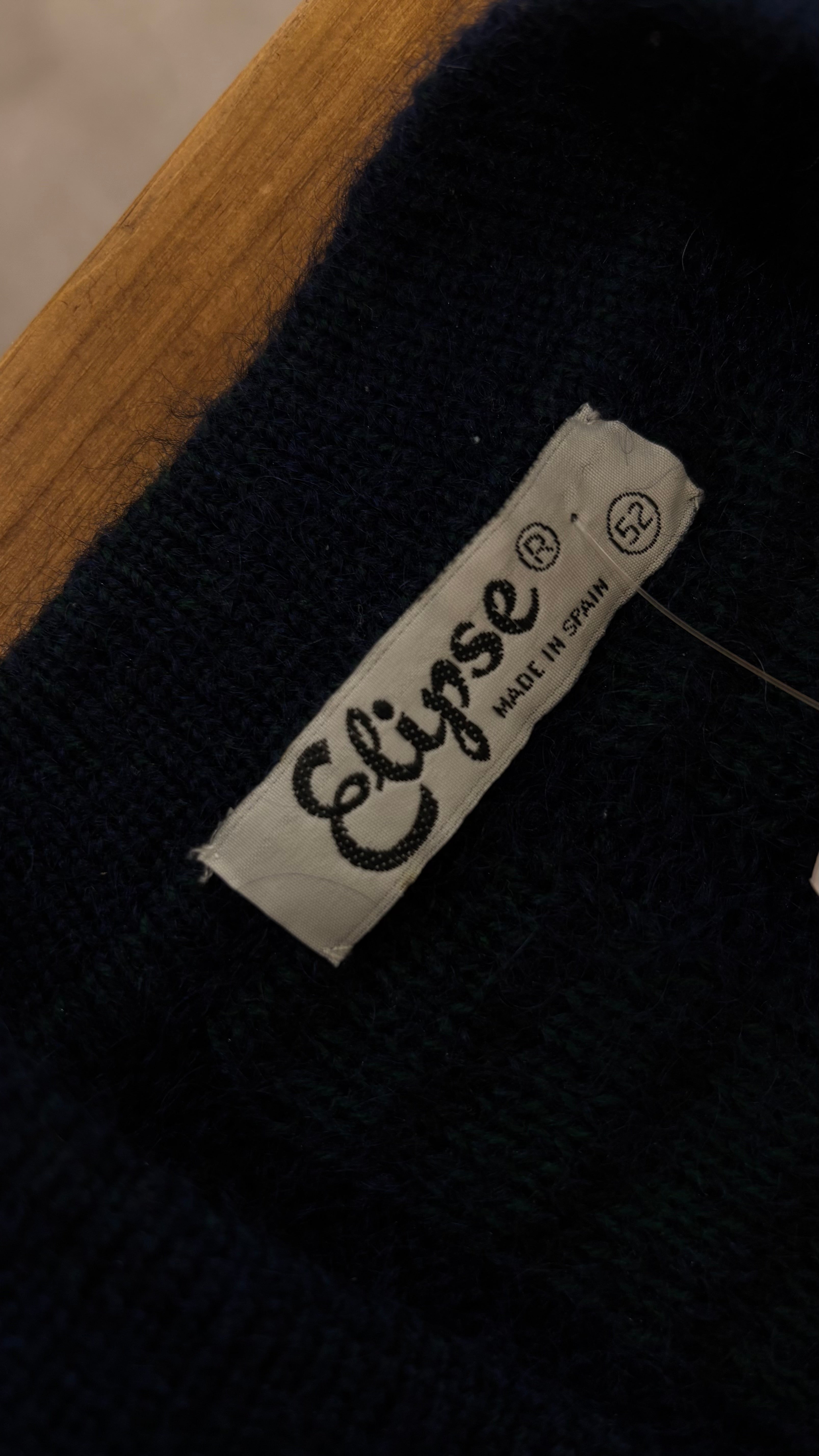 Vintage mohair knit sweater in an oversized silhouette, featuring deep navy blue and dark forest-green tones.