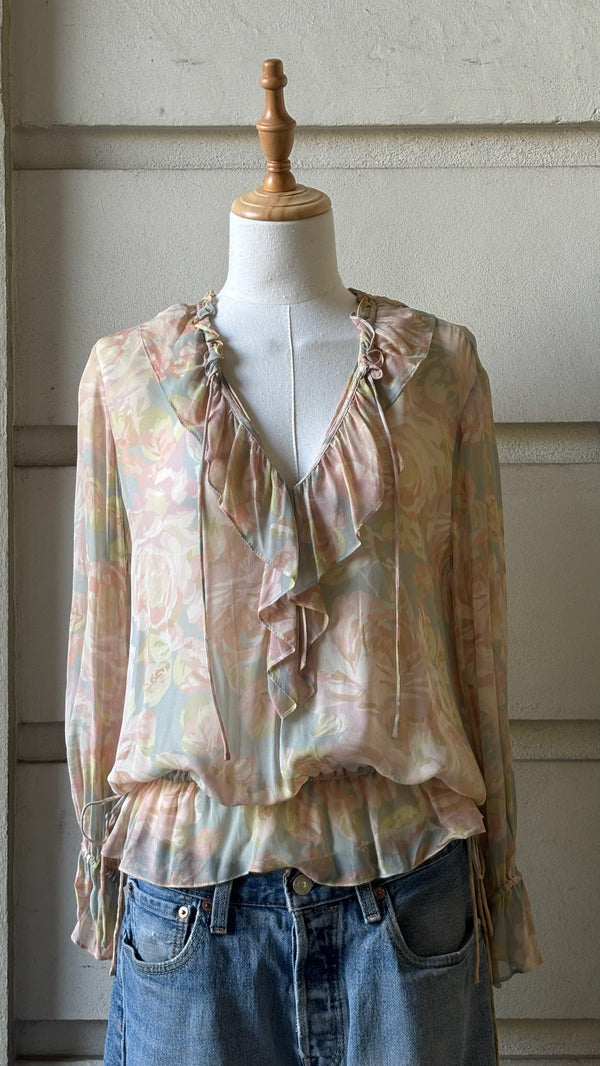 Flowy blouse with ruffles and pastel floral print