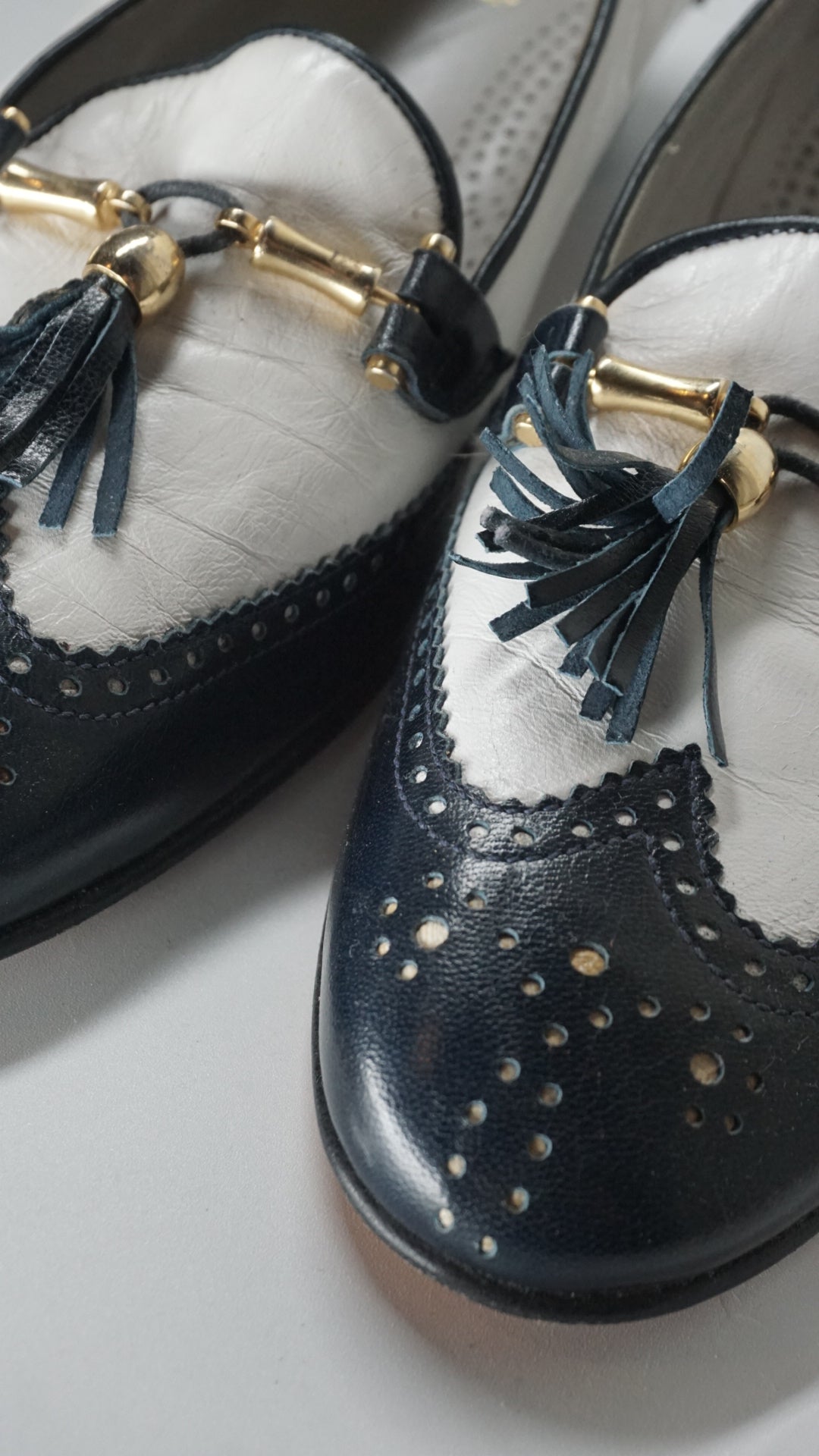 Black & White Shoes with Golden Accent