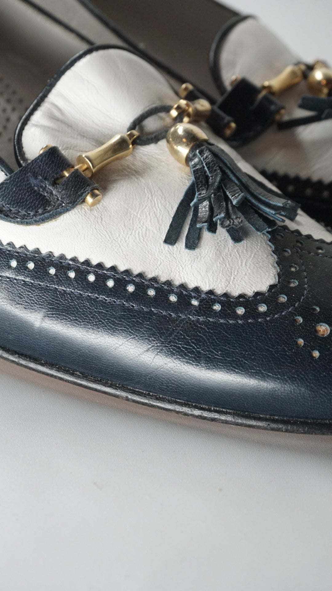 Black & White Shoes with Golden Accent