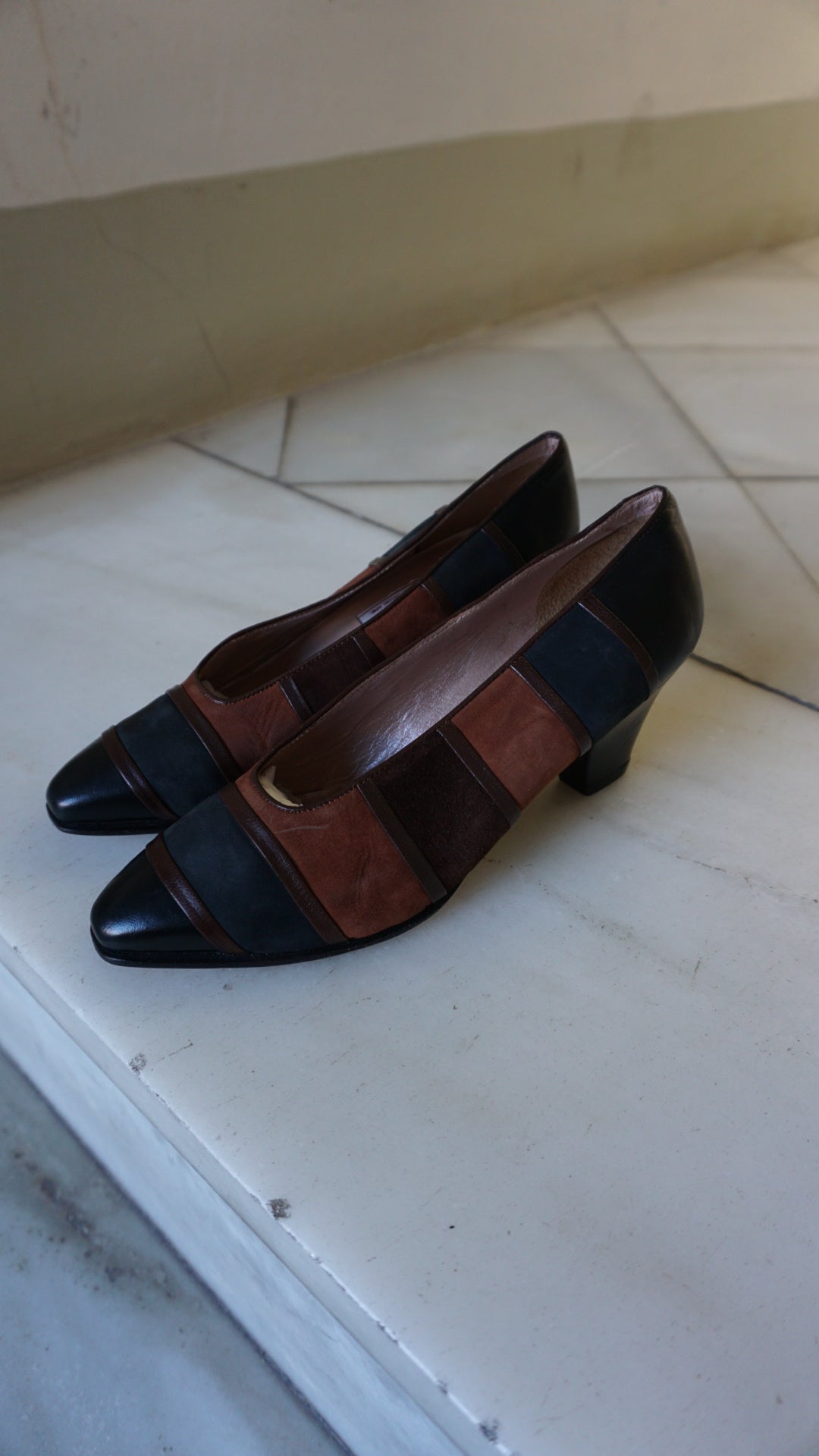 Vintage leather shoes in black and brown
