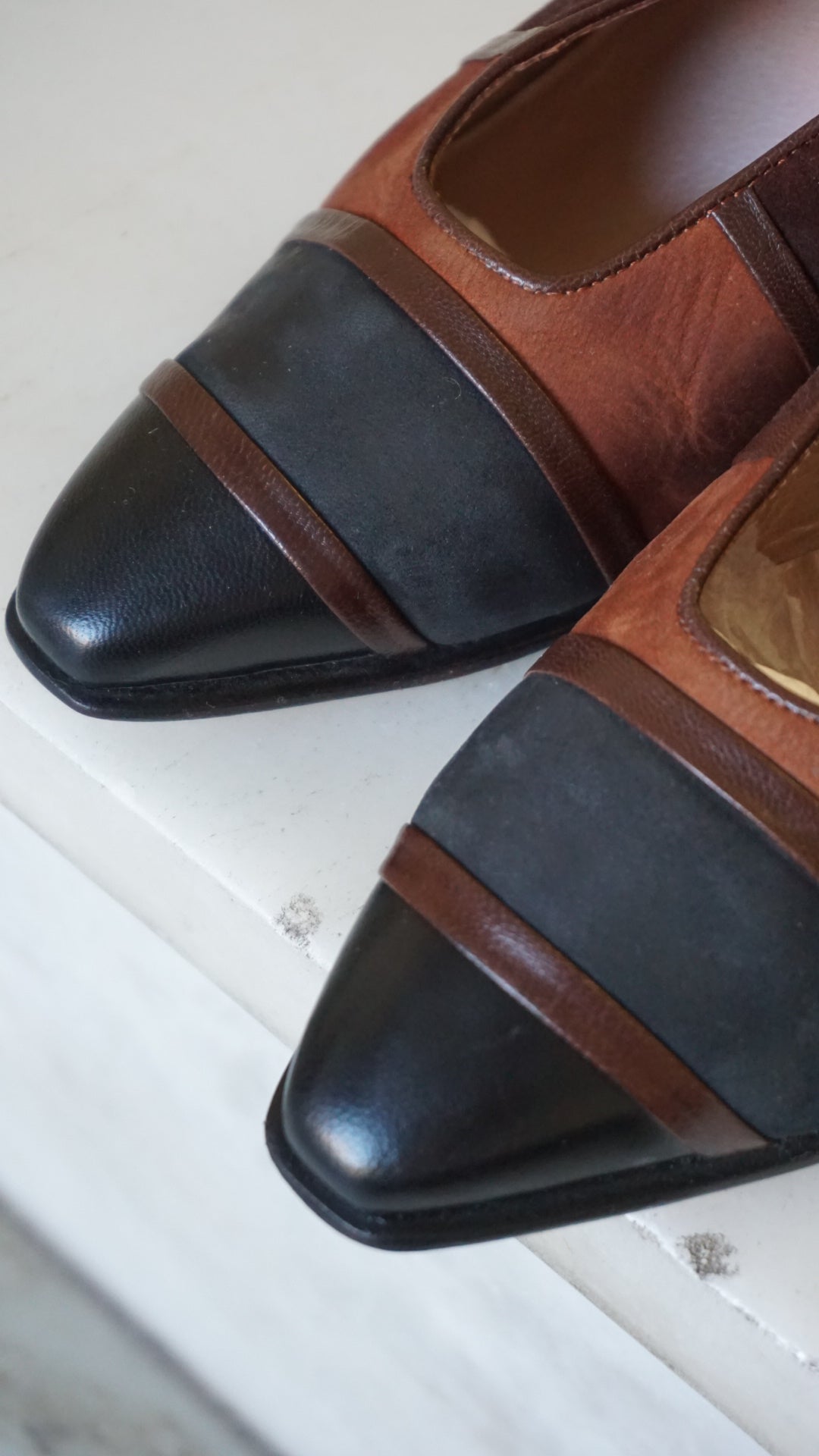 Vintage leather shoes in black and brown