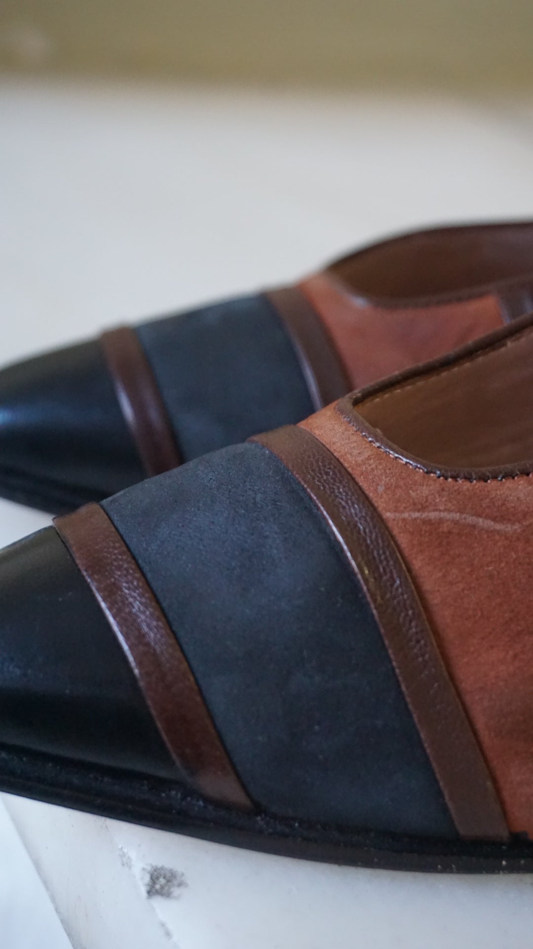 Vintage leather shoes in black and brown